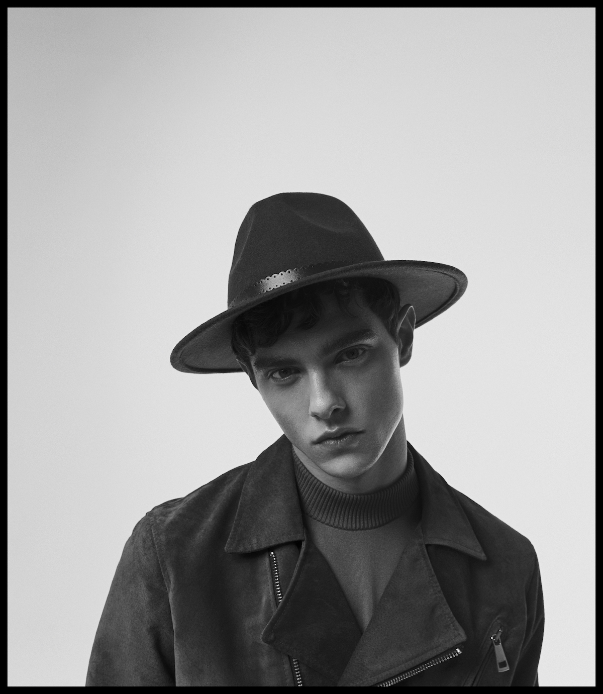 Hat ALLSAINTS; Jacket HARATYK; turtleneck A.P.C.